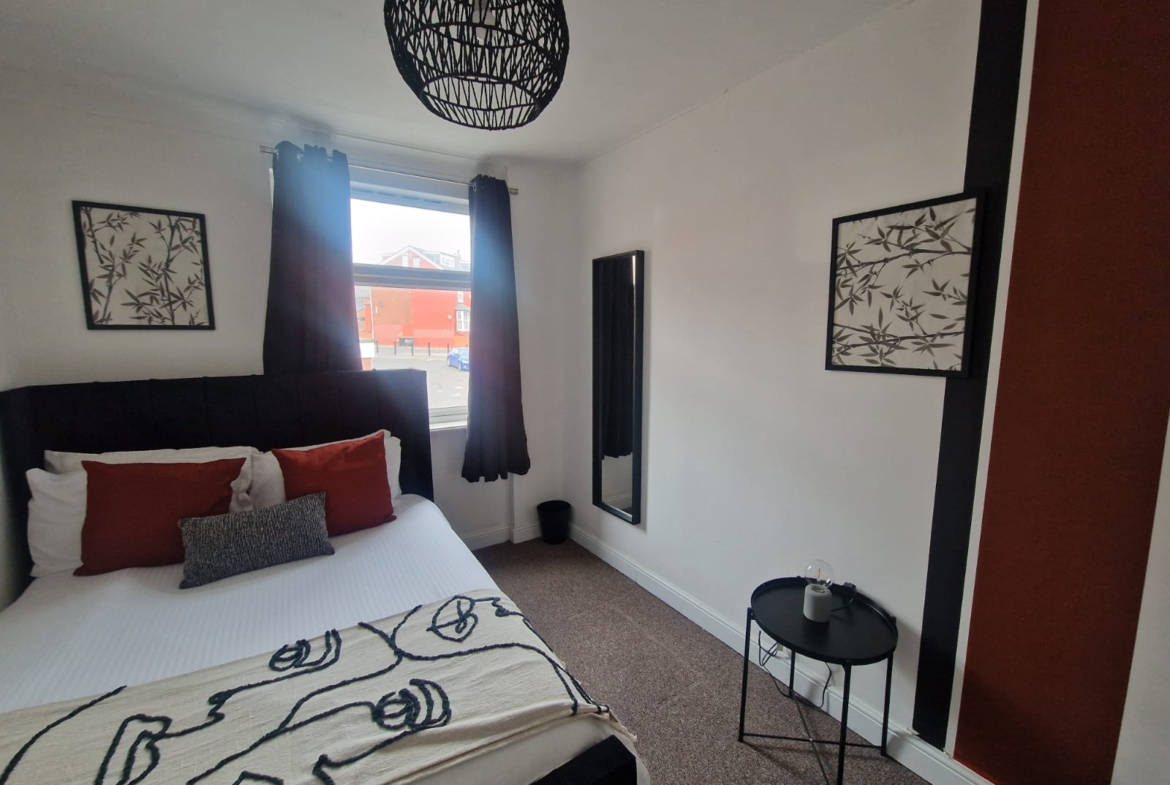 King-size bed listed by hmh stays providing long-term accommodation for contractors