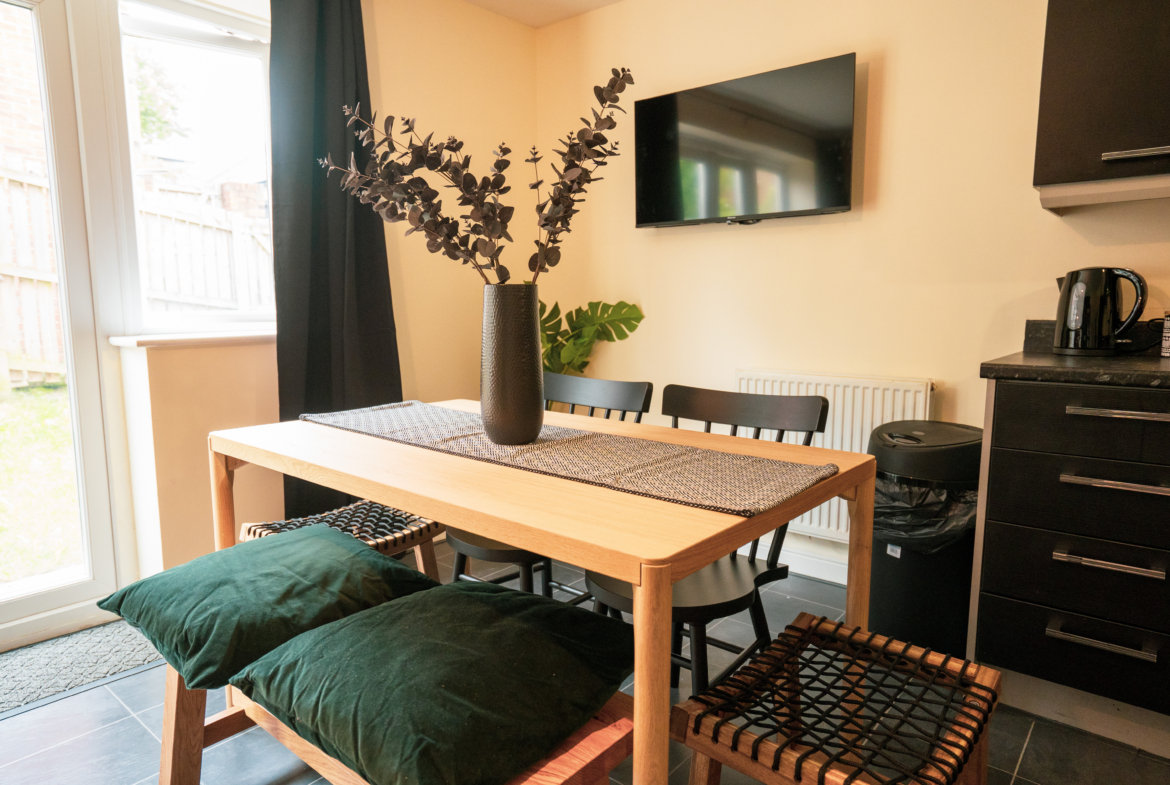 TV lounge and dining table for contractors listed by hmh stays