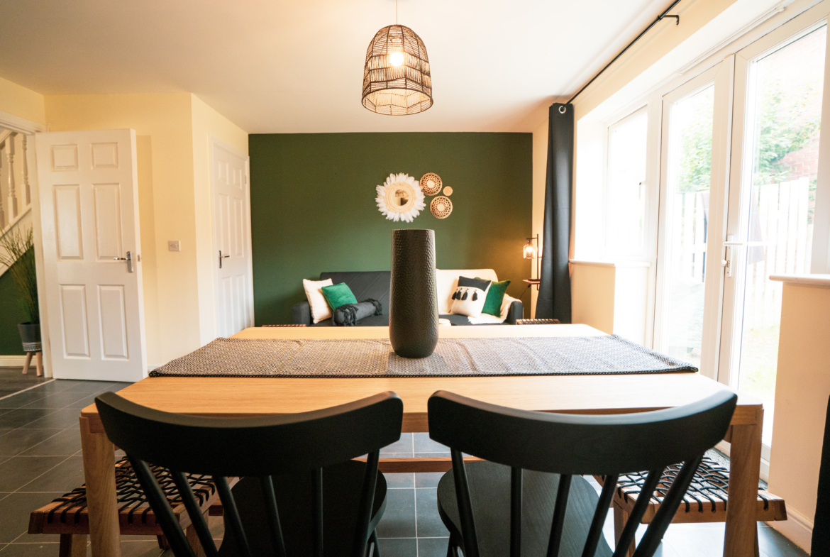 Dining table having meal for contractors listed by HMH Stays providing long term accommodation
