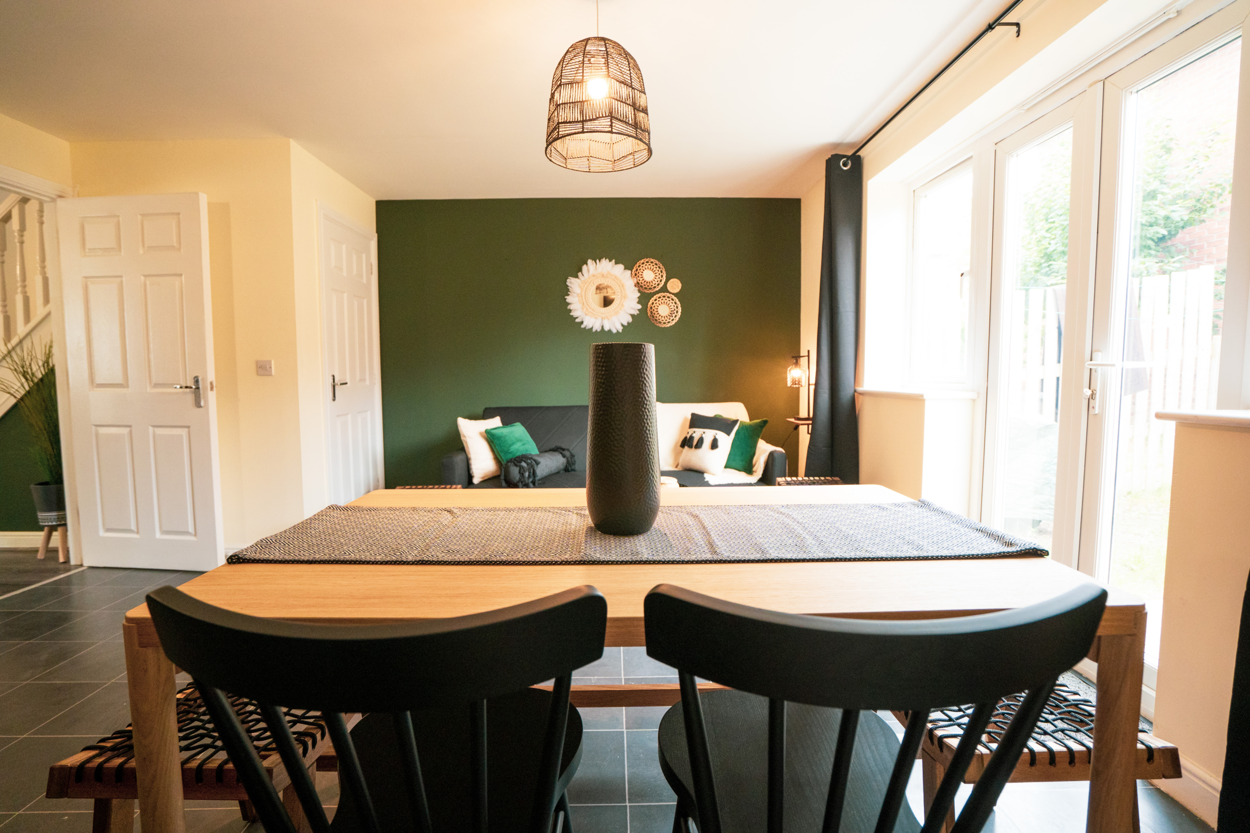 Dining table having meal for contractors listed by HMH Stays providing long term accommodation