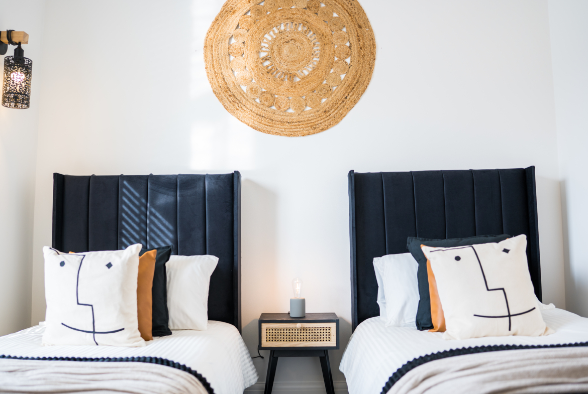 Two single-bedrooms listed by HMH Stays for long-term contractor accommodation