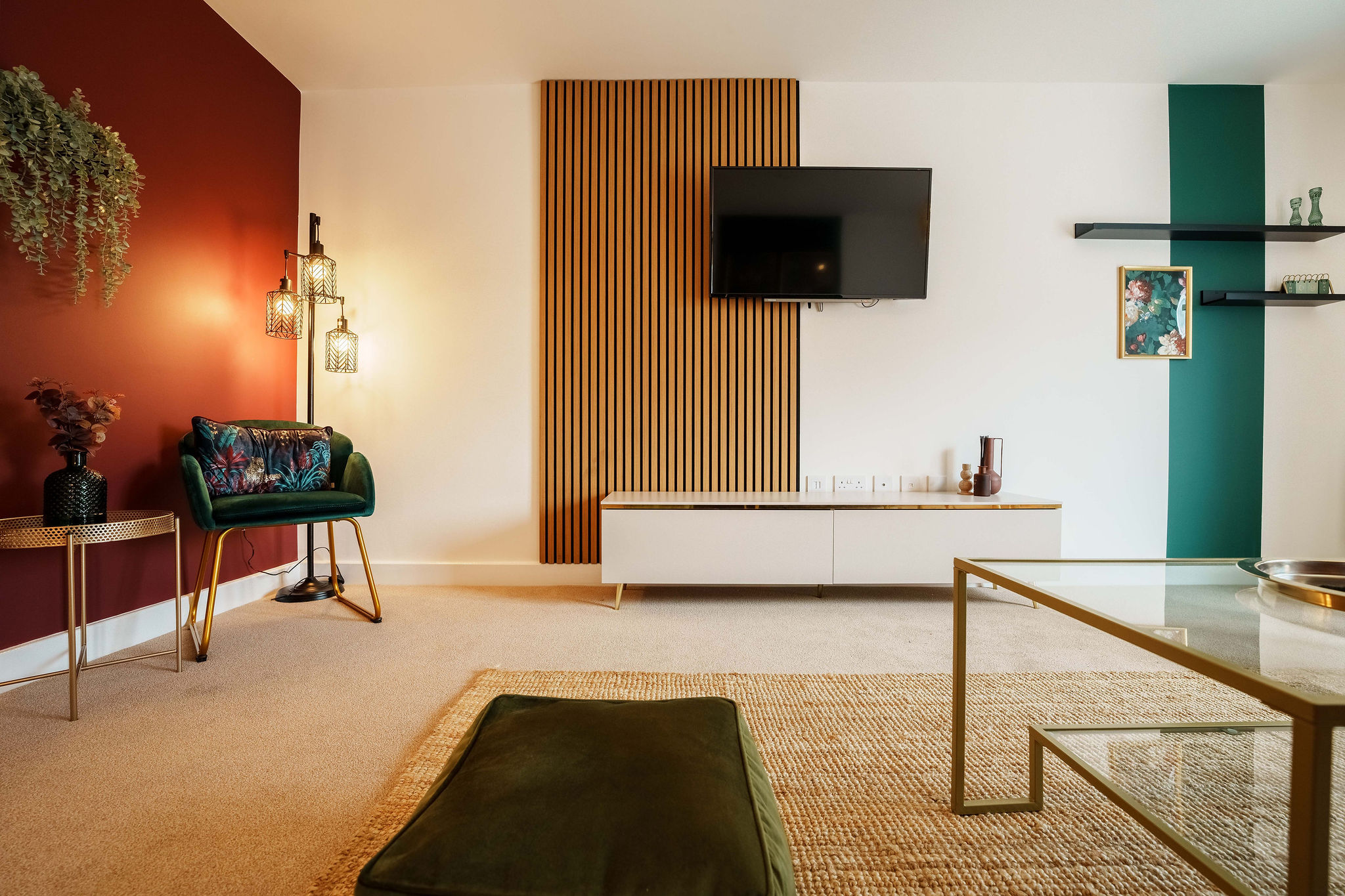 TV lounge with green chair listed by hmh Stays in UK