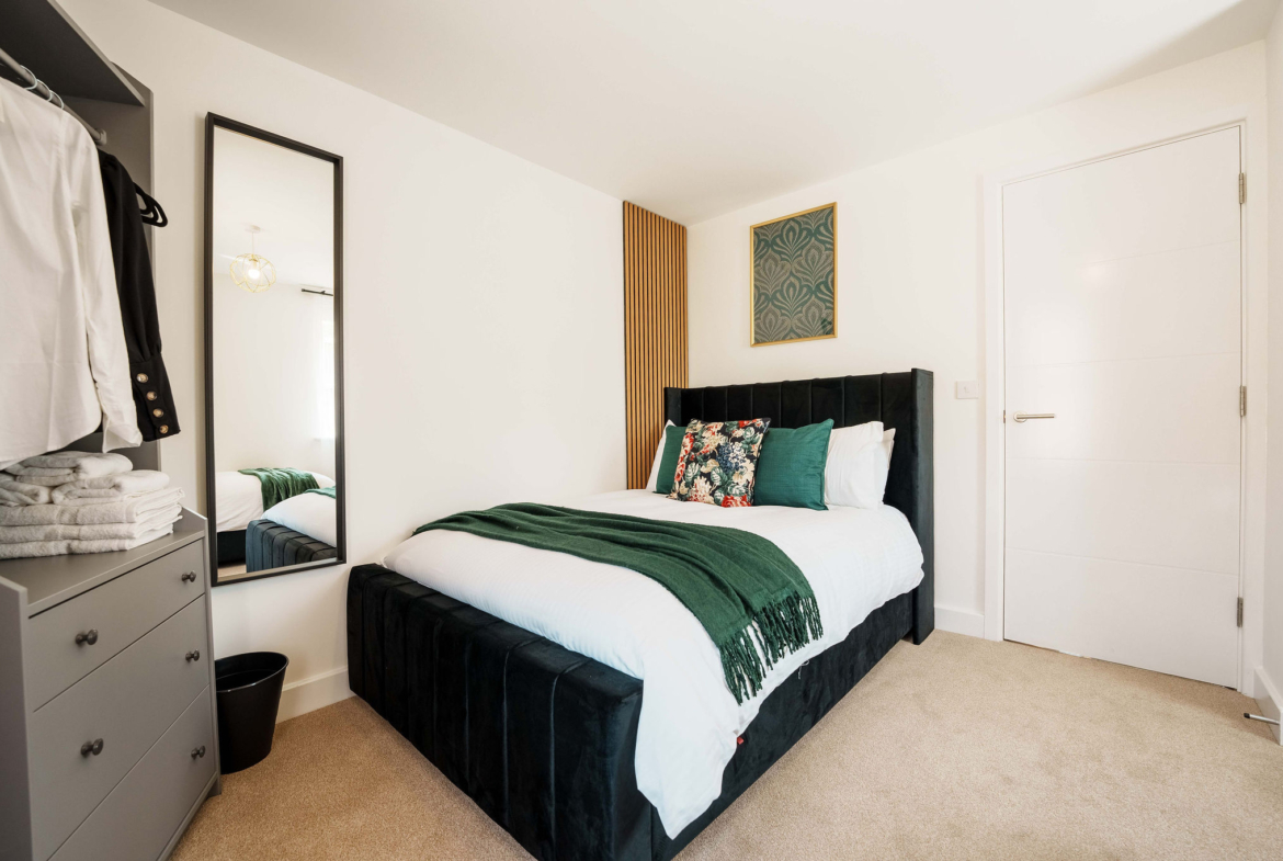 Queen-size bed for contractor accommodation by HMH Stays